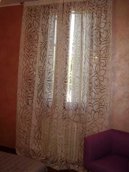 Le tende adatte alle pareti color lilla